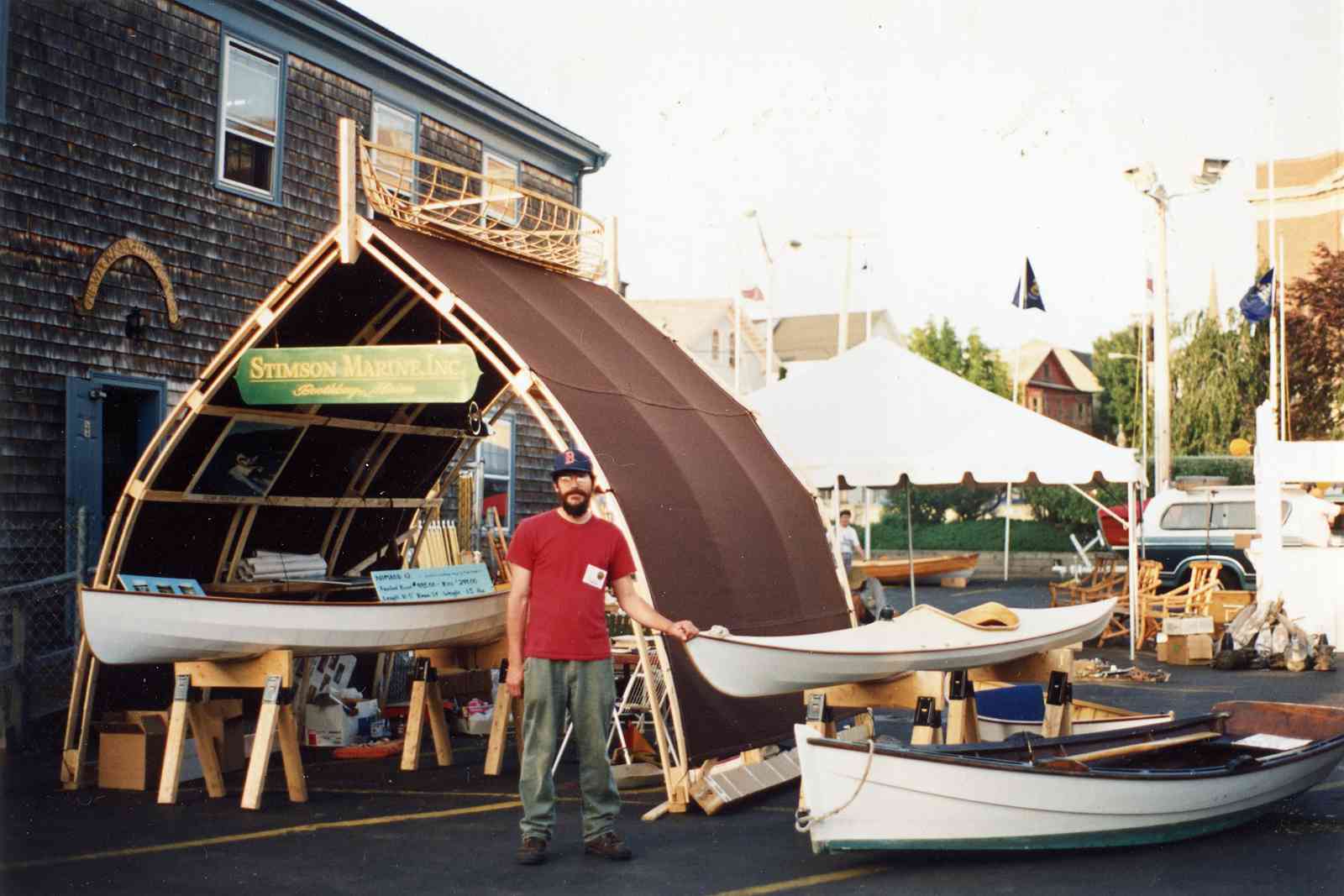Stimson Marine Booth at the Newport, RI WoodenBoat show in 1992, featuring Bow-Roof shed